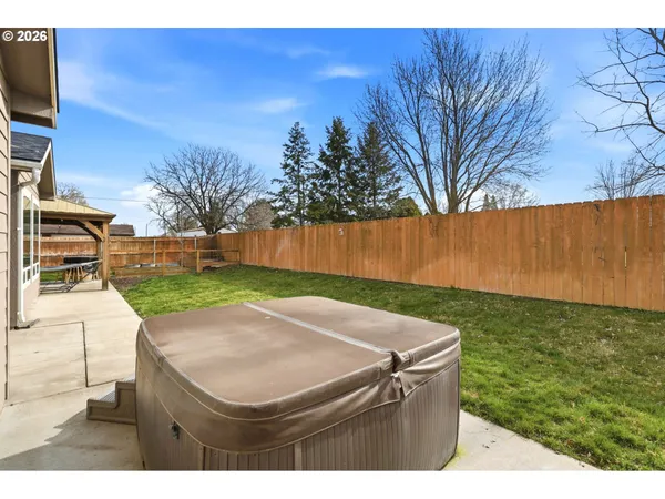 a backyard of a house with lots of green space