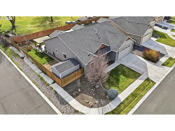 an aerial view of a house with a garden