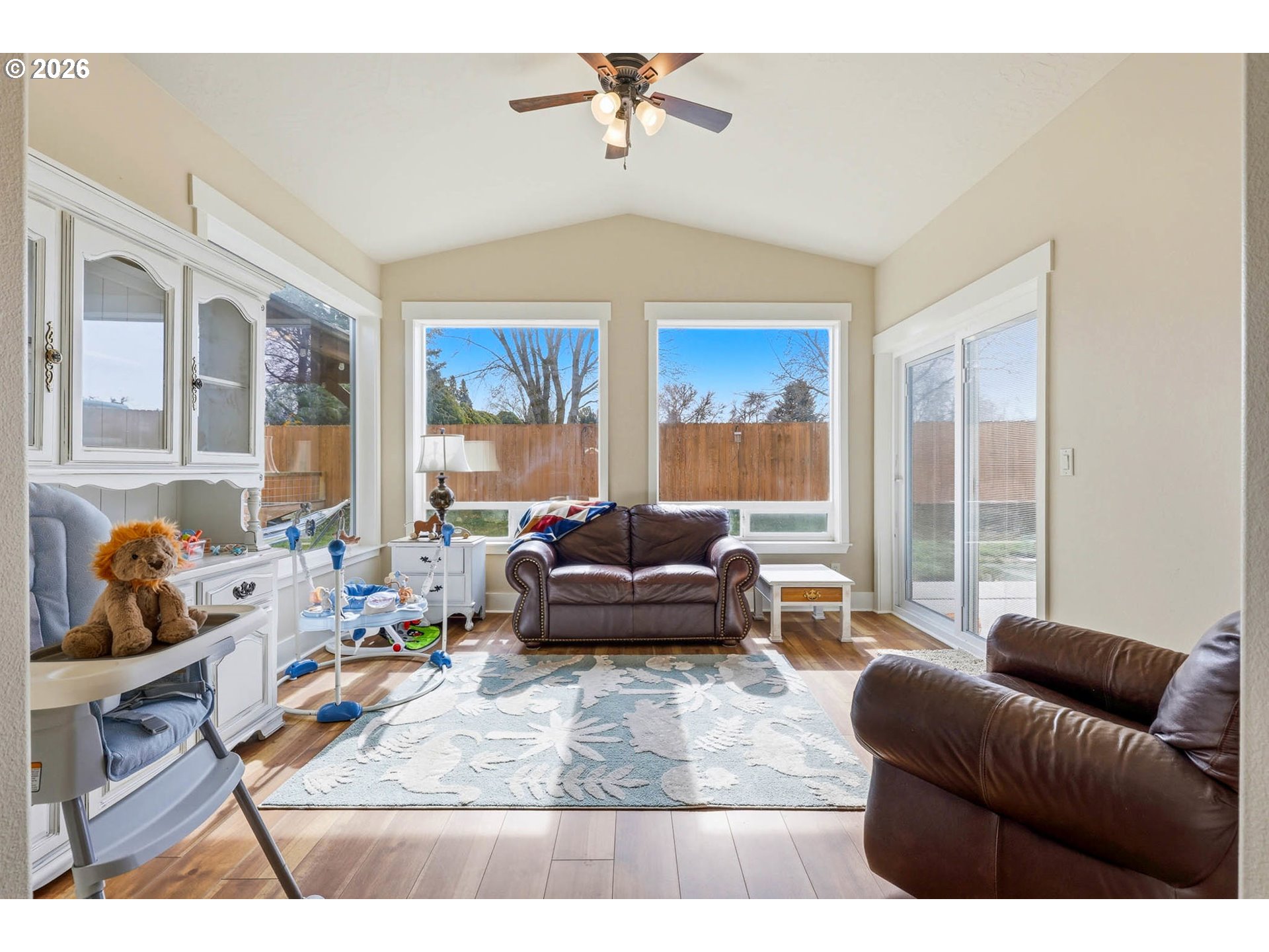 1003 Southwest Olive Court Hermiston, OR 97838 - Photo 6 of 34 a living room with furniture and a large window