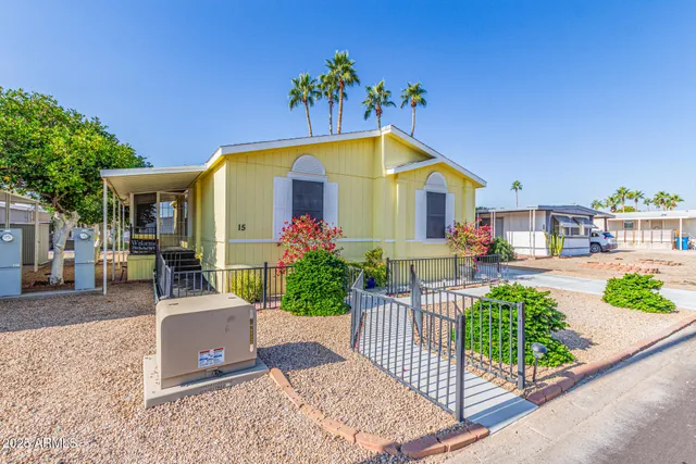 a front view of house with small garden