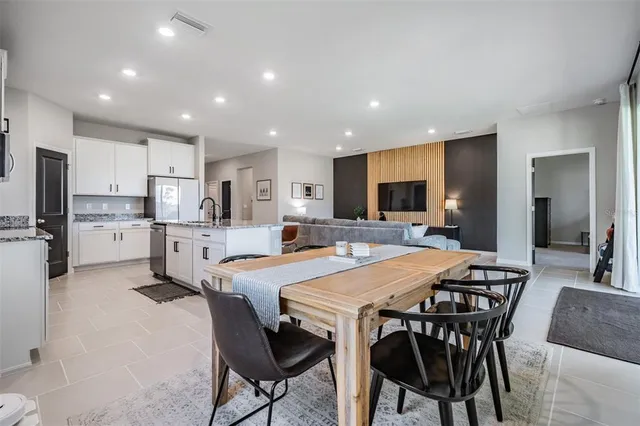 a bed room with a bed and a wall painting