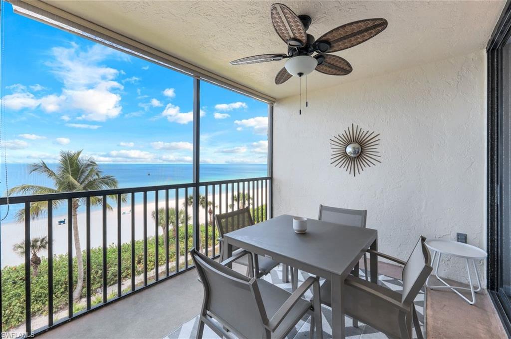 10475 Gulf Shore Drive, Unit 142 Naples, FL 34108 - Photo 2 of 14 a view of a dining room with furniture window and outside view