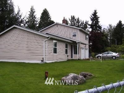 22223 2nd Avenue West Bothell, WA 98021 - Photo 1 of 1 a view of a house with a yard