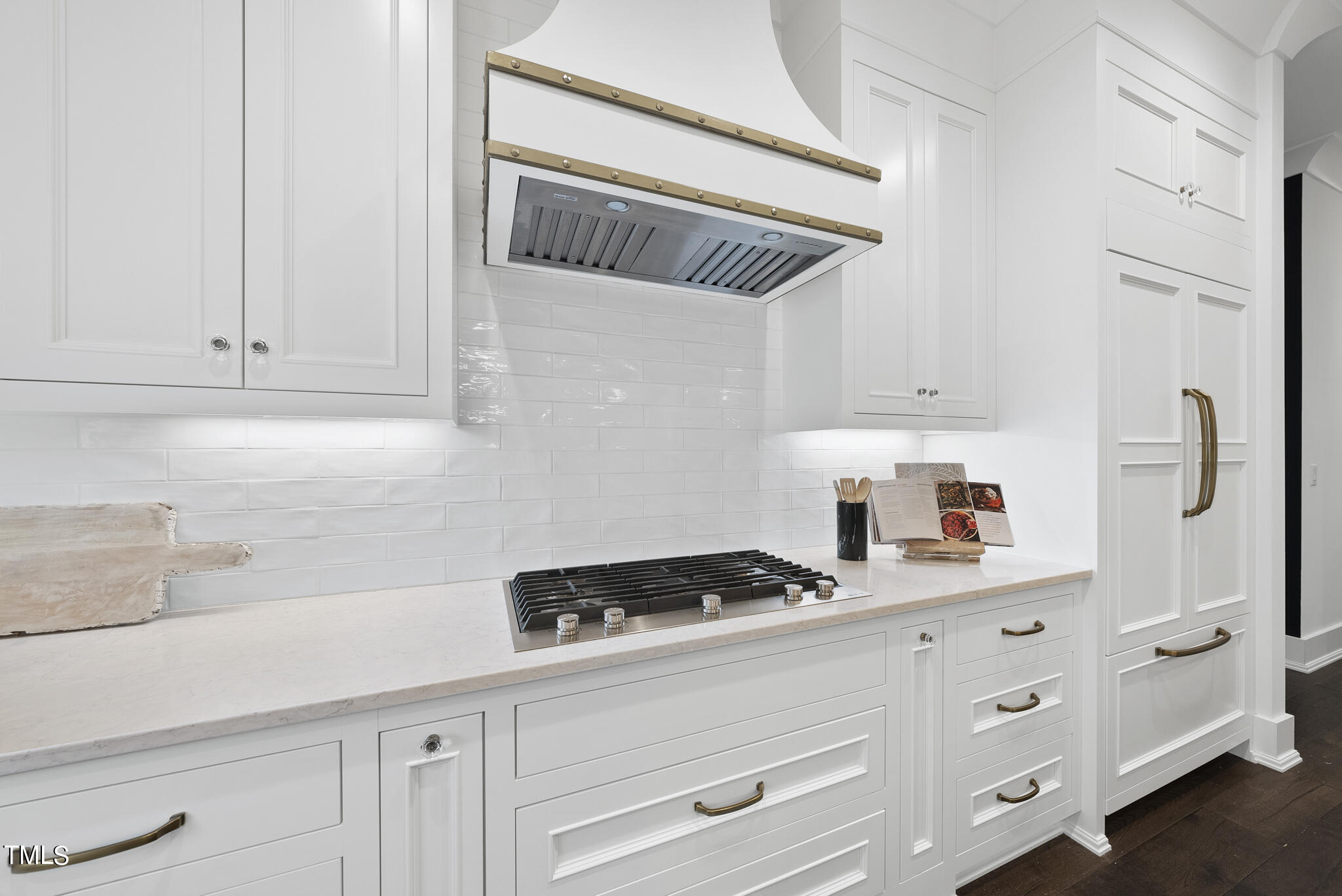 115 Edenburgh Road Raleigh, NC 27608 - Photo 14 of 50 a kitchen with white cabinets and white appliances
