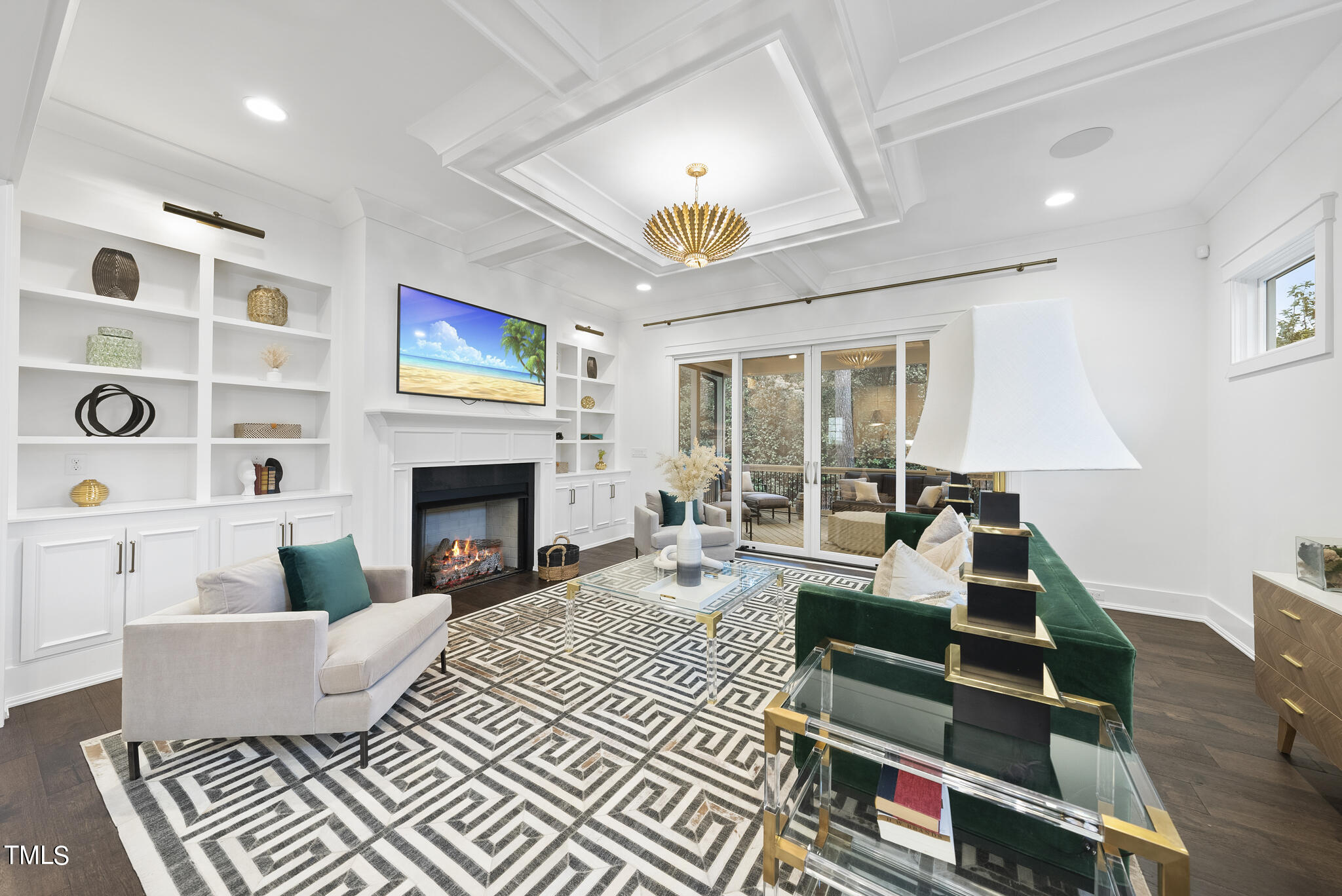 115 Edenburgh Road Raleigh, NC 27608 - Photo 18 of 50 a living room with furniture a fireplace and a flat screen tv
