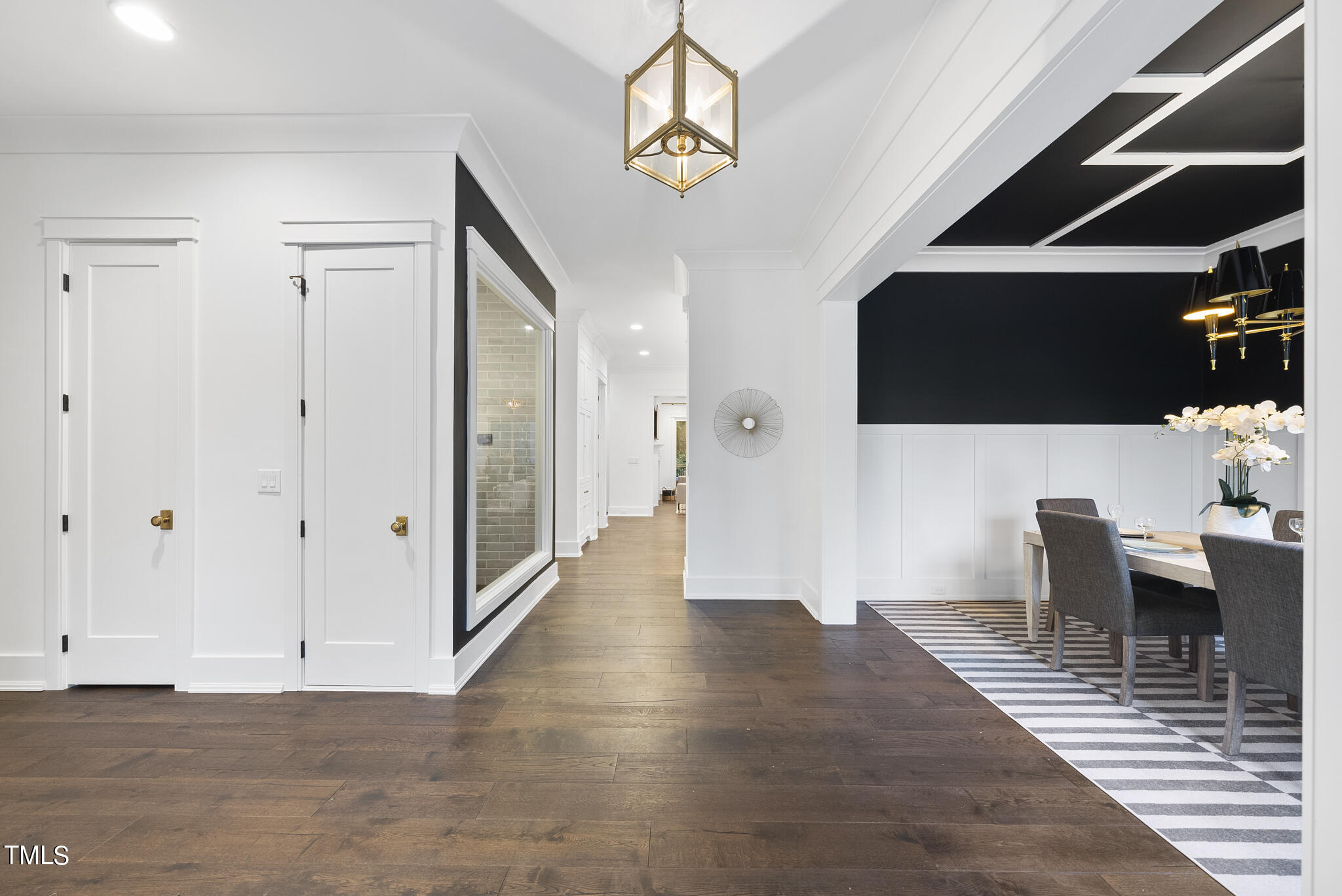 115 Edenburgh Road Raleigh, NC 27608 - Photo 2 of 50 a view of a livingroom with furniture and a flat screen tv
