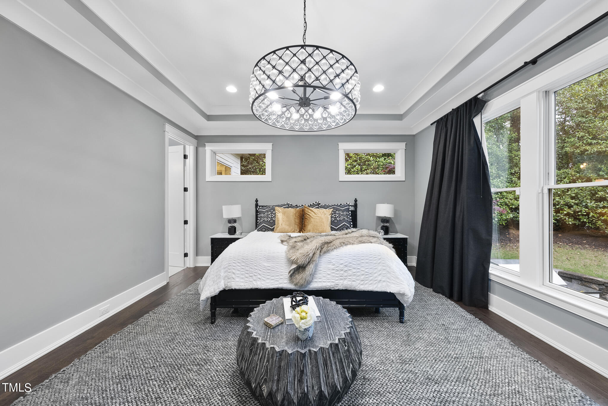 115 Edenburgh Road Raleigh, NC 27608 - Photo 22 of 50 a bedroom with a bed mirror and window