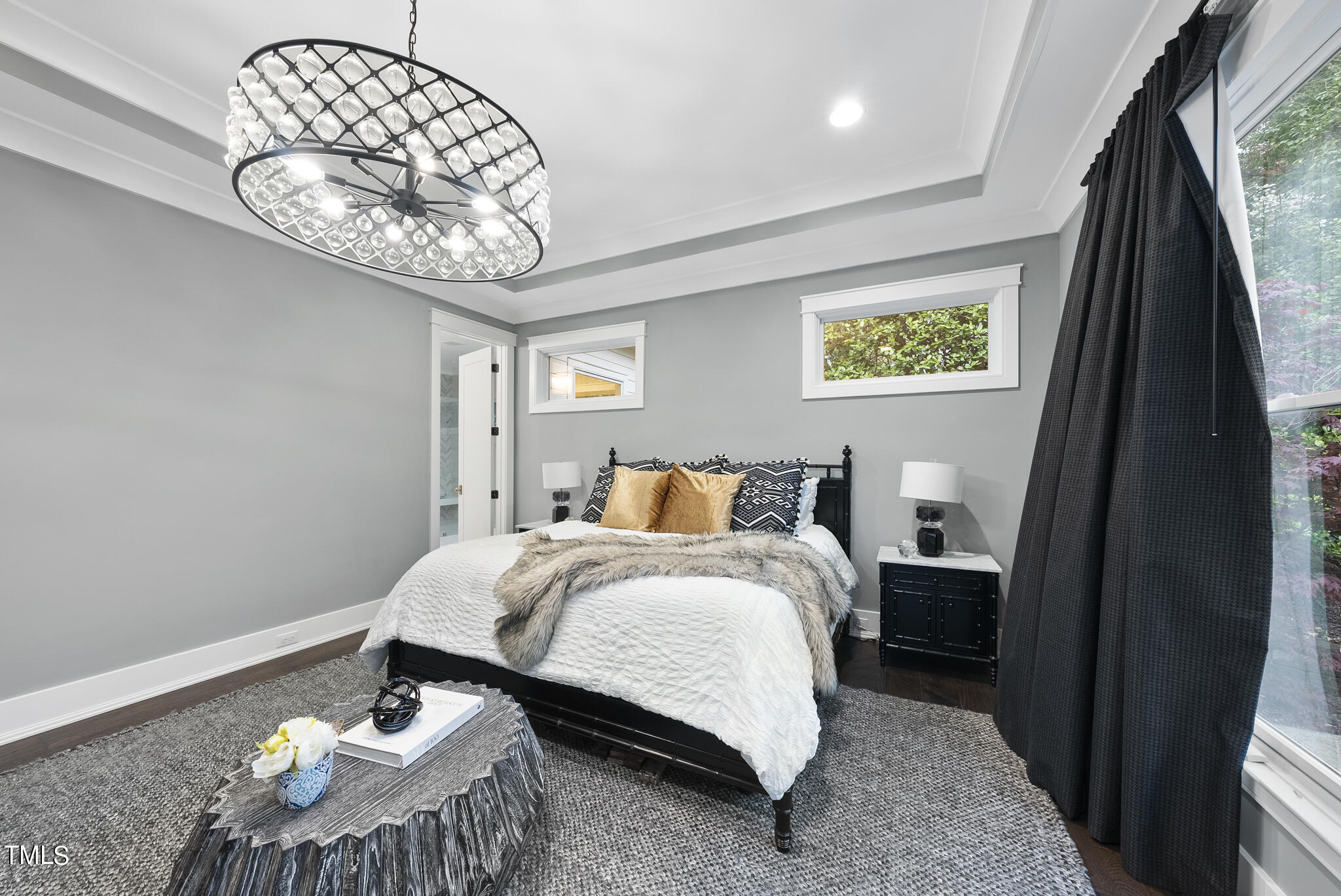 115 Edenburgh Road Raleigh, NC 27608 - Photo 23 of 50 a bedroom with bed and a window