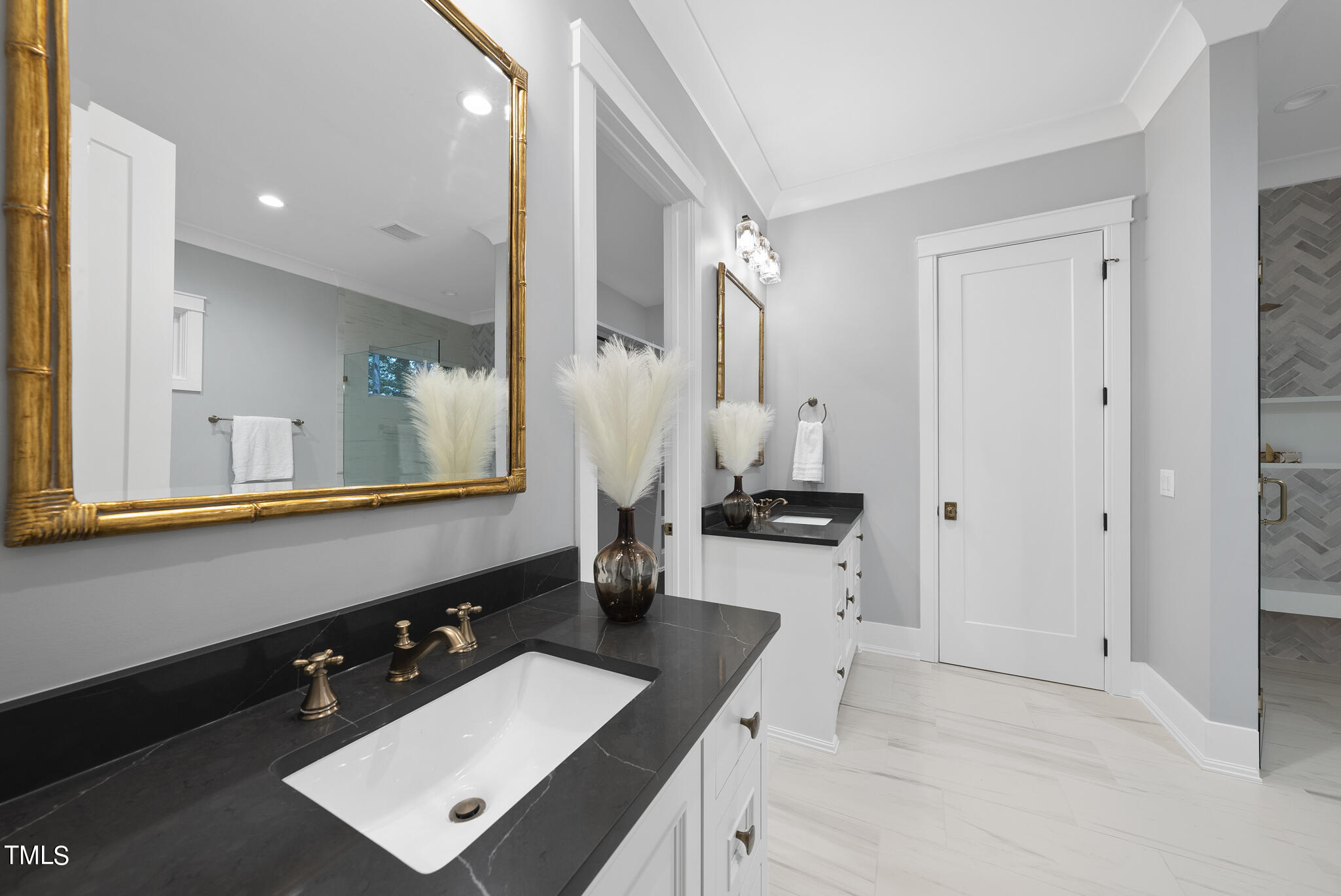 115 Edenburgh Road Raleigh, NC 27608 - Photo 24 of 50 a room with two sink and a window