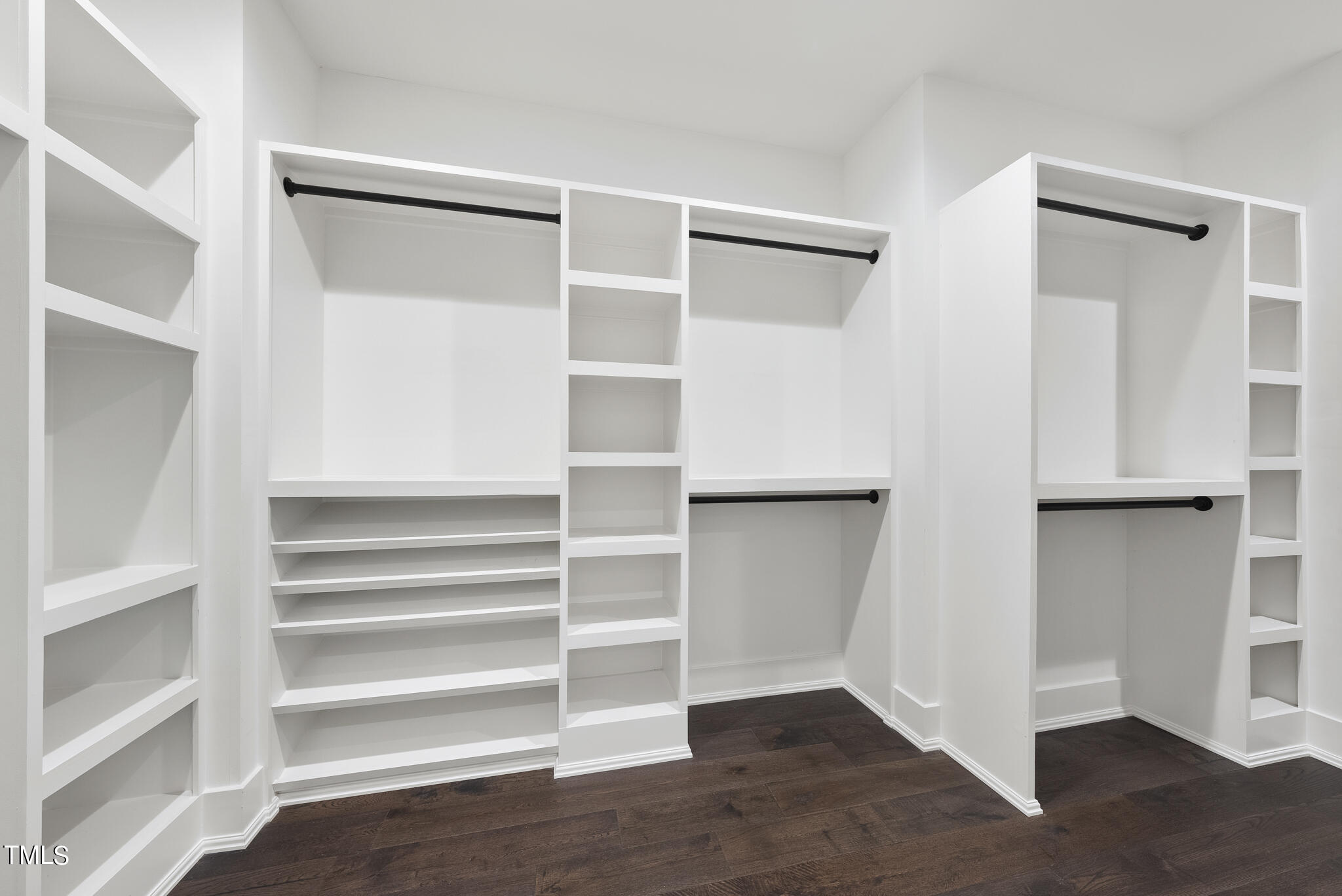 115 Edenburgh Road Raleigh, NC 27608 - Photo 28 of 50 a view of walk in closet with empty racks