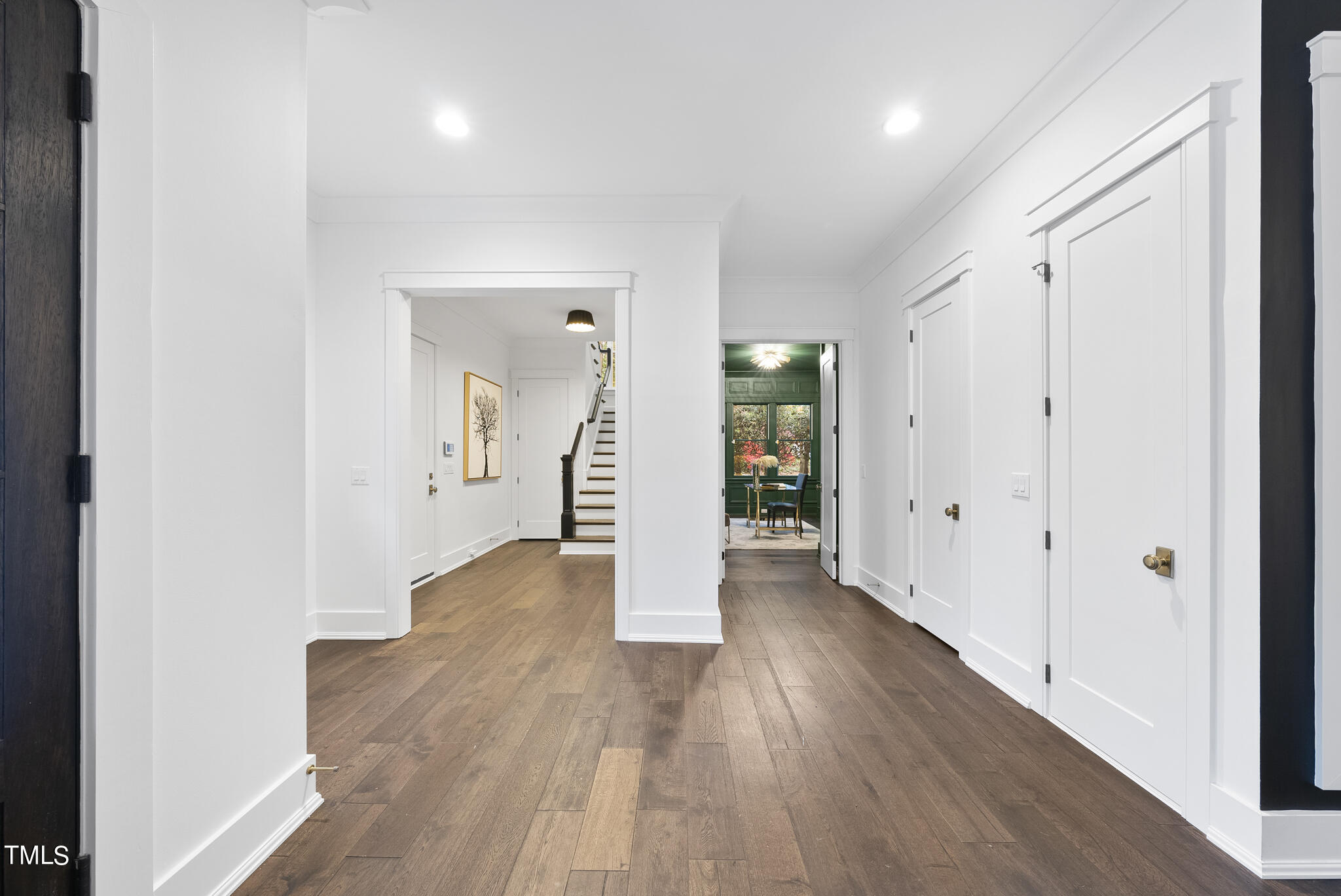 115 Edenburgh Road Raleigh, NC 27608 - Photo 3 of 50 wooden floor in an empty room