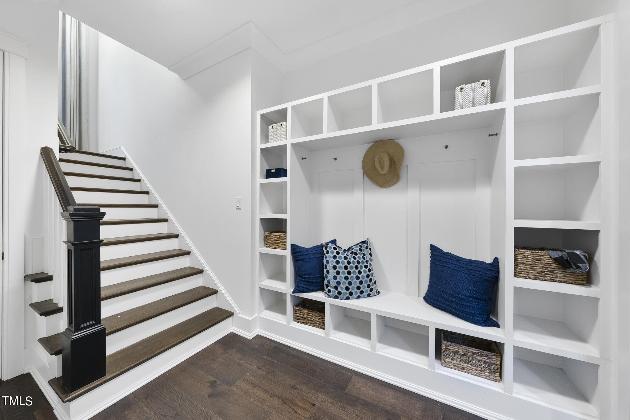 115 Edenburgh Road Raleigh, NC 27608 - Photo 31 of 50 a view of dining room with stairs and wooden floor