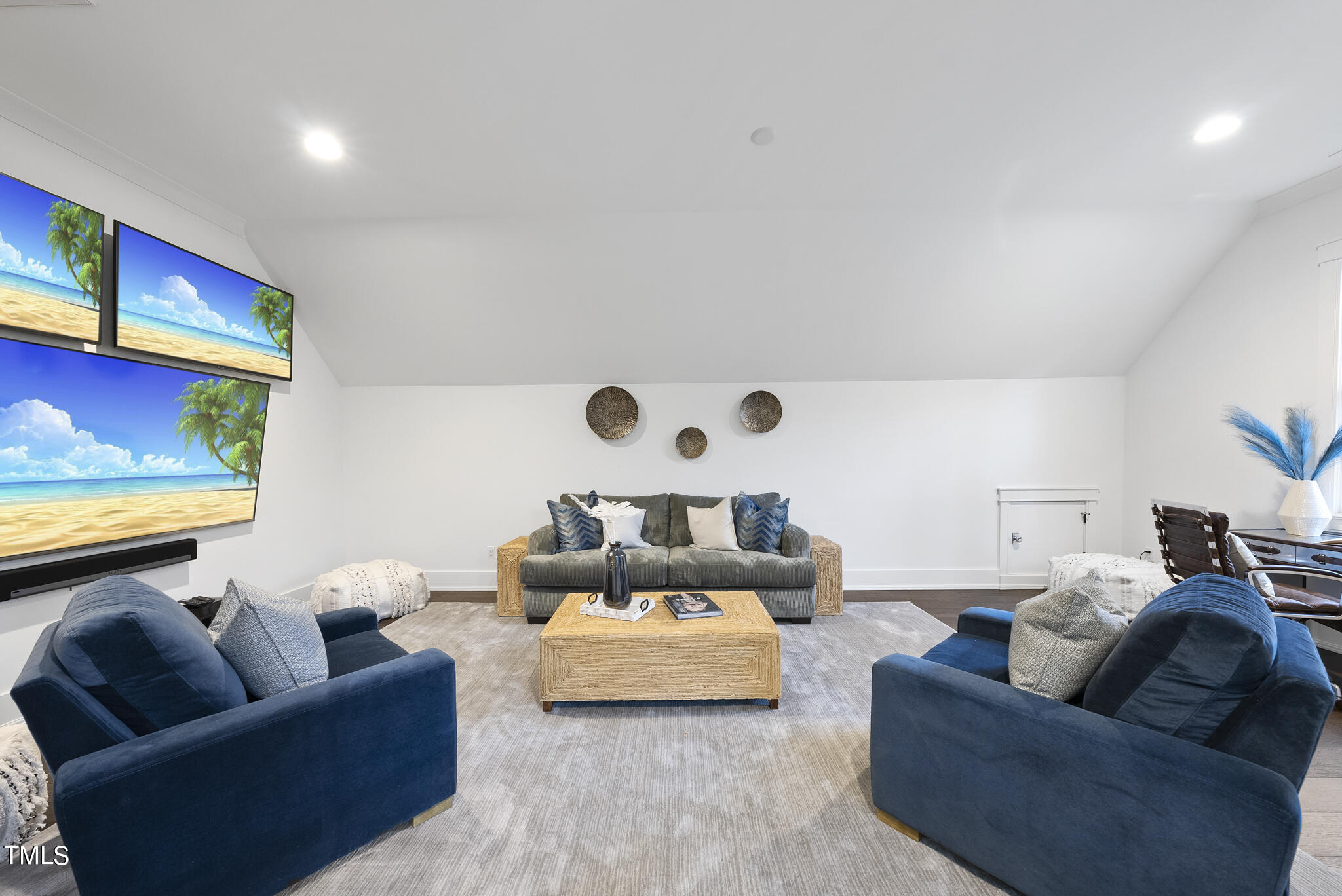 115 Edenburgh Road Raleigh, NC 27608 - Photo 32 of 50 a living room with furniture and a flat screen tv