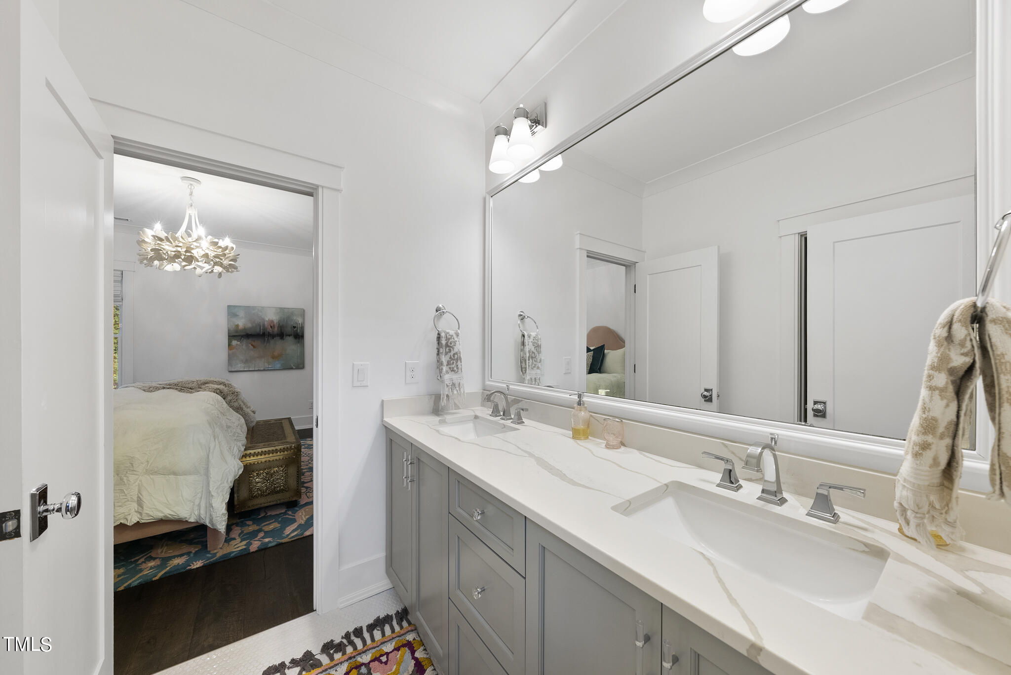 115 Edenburgh Road Raleigh, NC 27608 - Photo 40 of 50 a en suite bathroom with a double vanity sink and a mirror