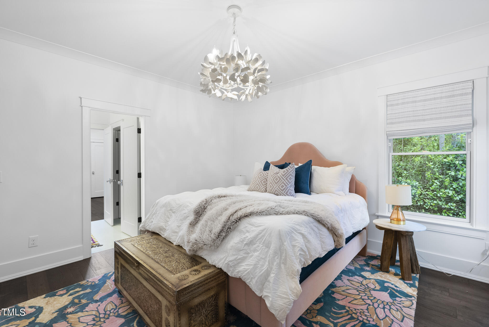 115 Edenburgh Road Raleigh, NC 27608 - Photo 42 of 50 a bedroom with a bed table and window