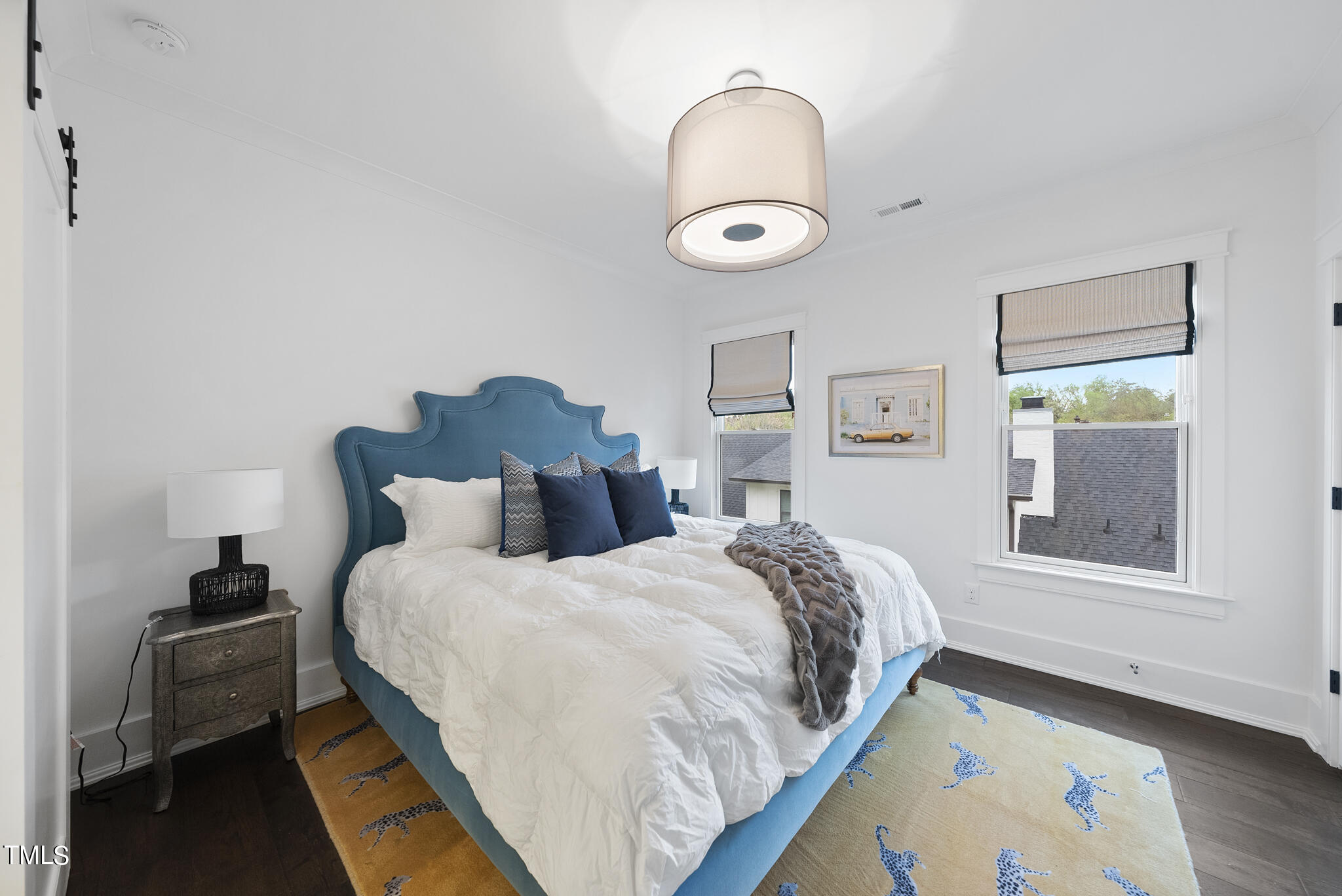 115 Edenburgh Road Raleigh, NC 27608 - Photo 43 of 50 a bedroom with bed and a window