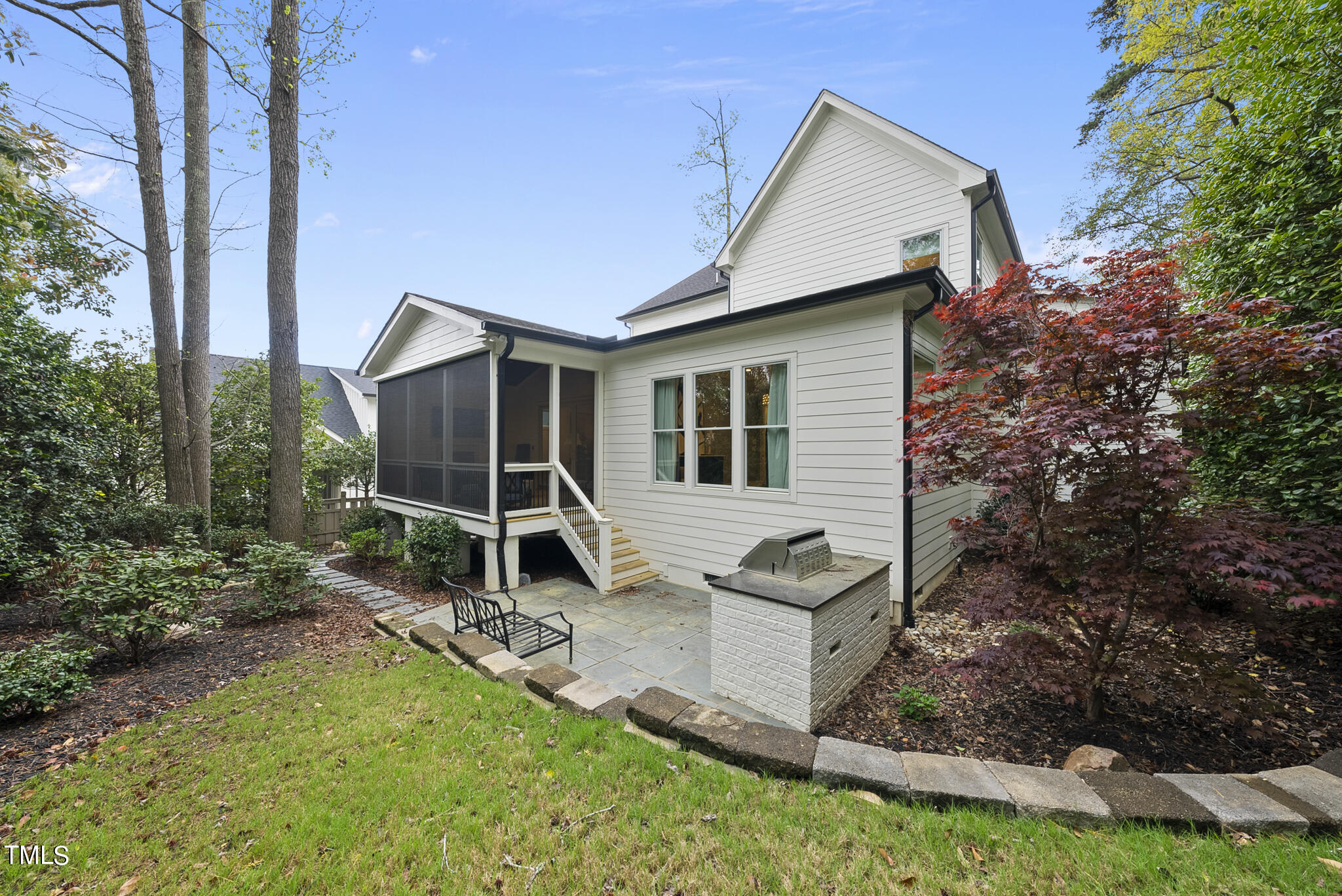 115 Edenburgh Road Raleigh, NC 27608 - Photo 50 of 50 a view of a house with backyard and garden