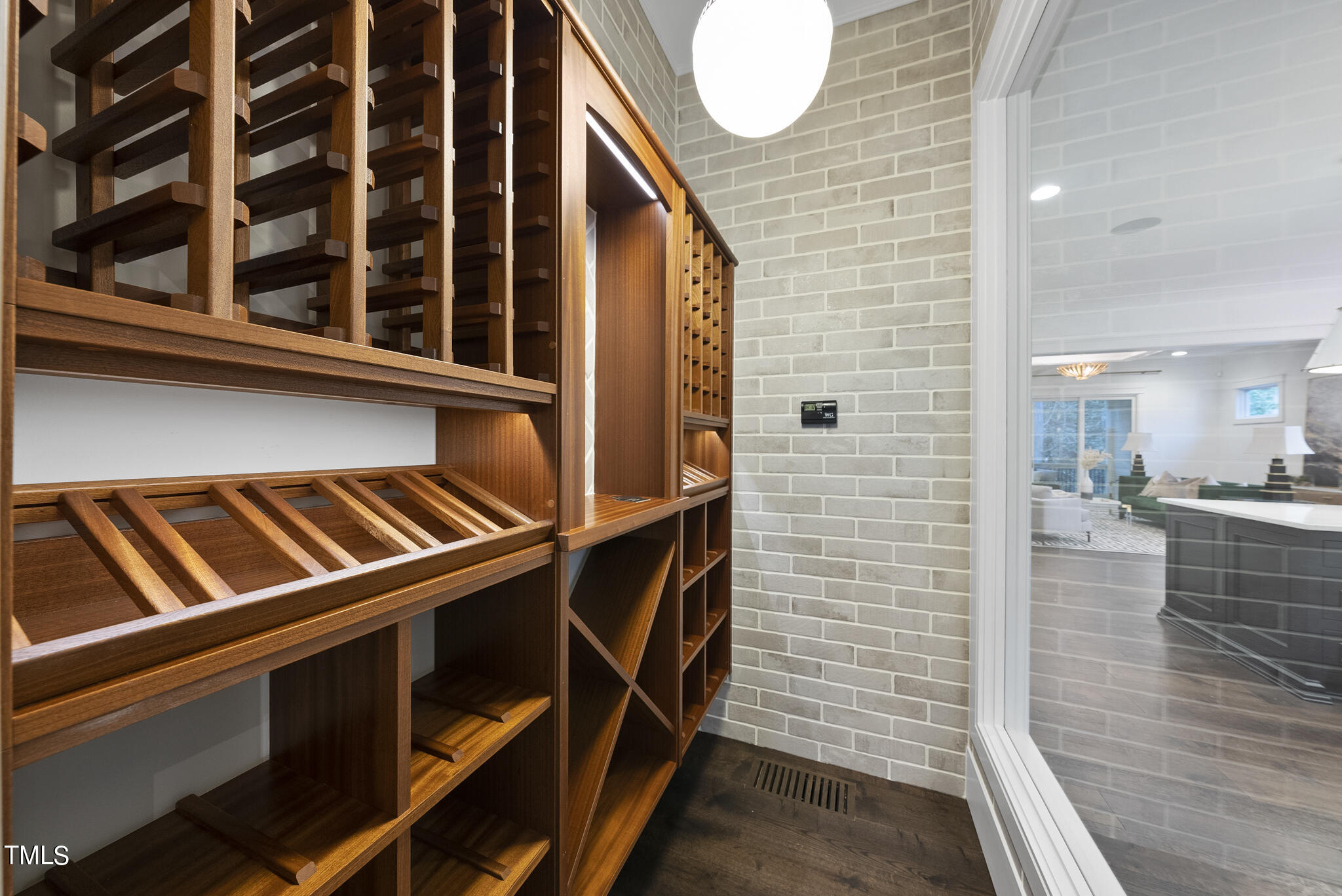 115 Edenburgh Road Raleigh, NC 27608 - Photo 9 of 50 a view of an empty room and wooden floor