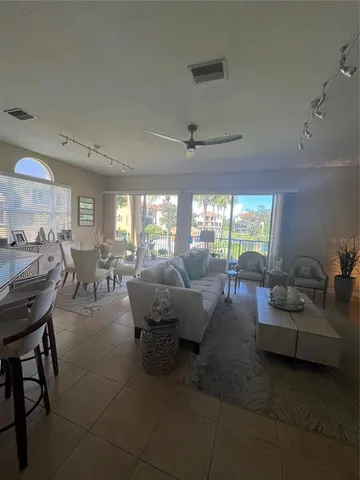 a view of a balcony with furniture