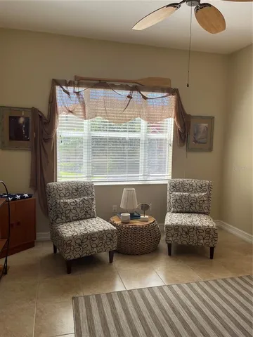 a bathroom with a bathtub and a window