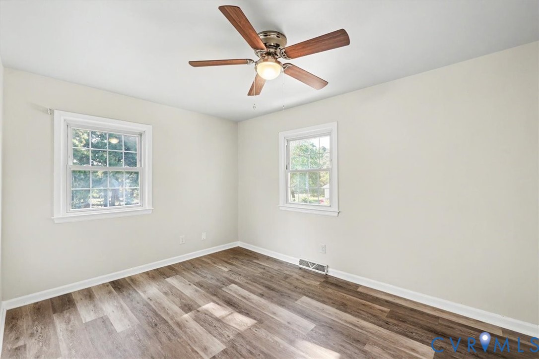 9737 Graves Road Petersburg, VA 23803 - Photo 20 of 41 Bright corner bedroom featuring hardwood flooring,
