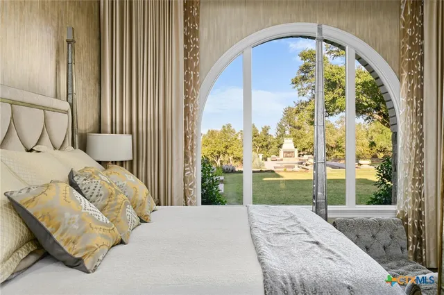 a front view of a house with a yard and a garage