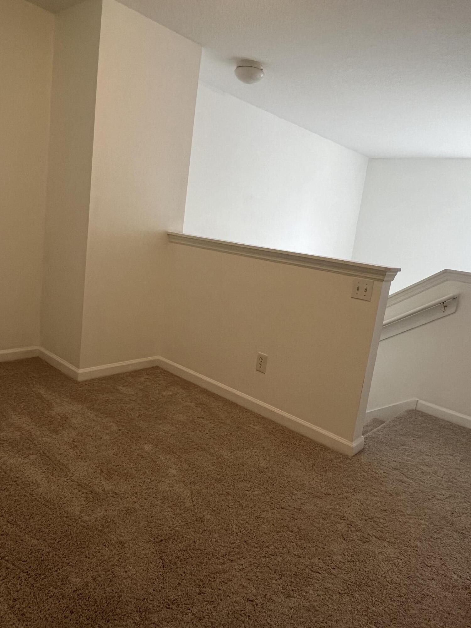 2785 Reston Street, Unit 102 Melbourne, FL 32935 - Photo 22 of 27 an empty room with an empty space