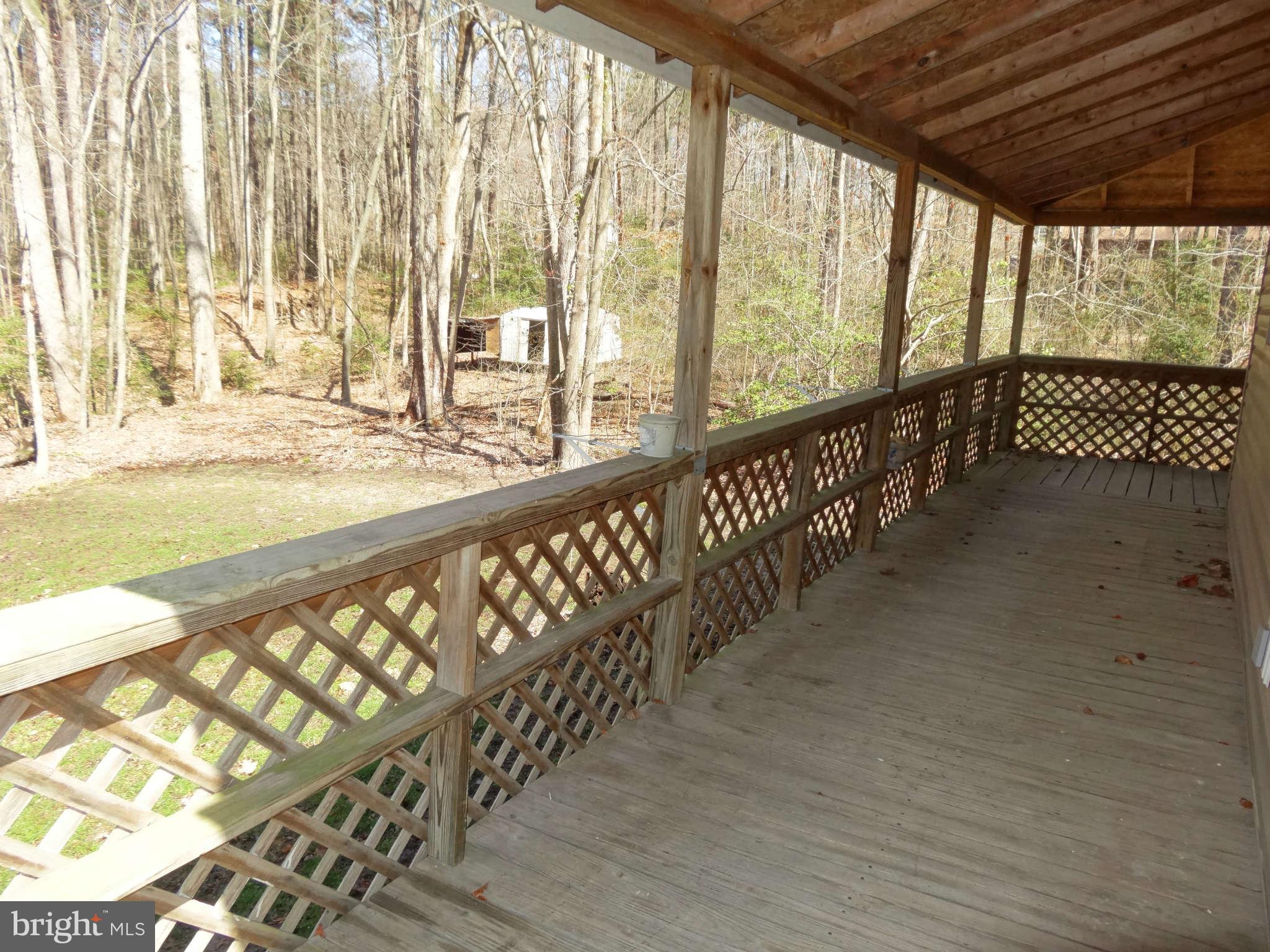 340 Maverick Road Lusby, MD 20657 - Photo 13 of 21 Covered deck at back of home