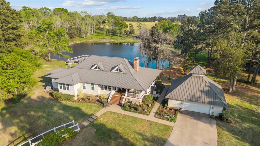 810 East Fm 321 Palestine, TX 75803 - Photo 1 of 40 an aerial view of a house with a yard