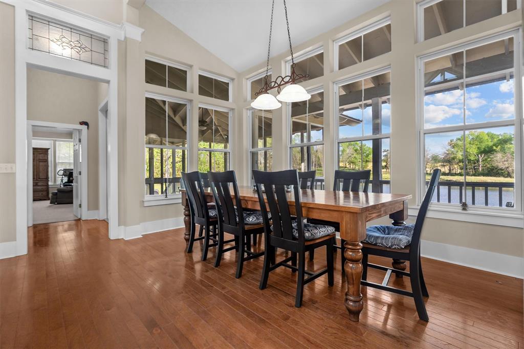 810 East Fm 321 Palestine, TX 75803 - Photo 16 of 40 a view of a dining room with furniture window and wooden floor