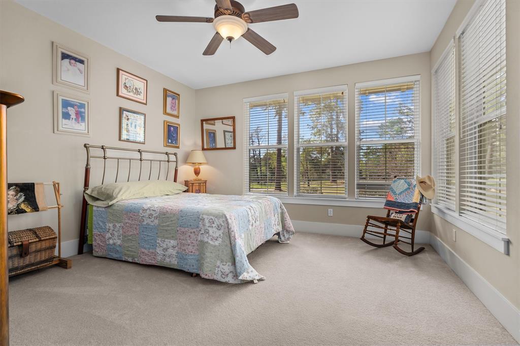 810 East Fm 321 Palestine, TX 75803 - Photo 21 of 40 a bedroom with a bed and large windows