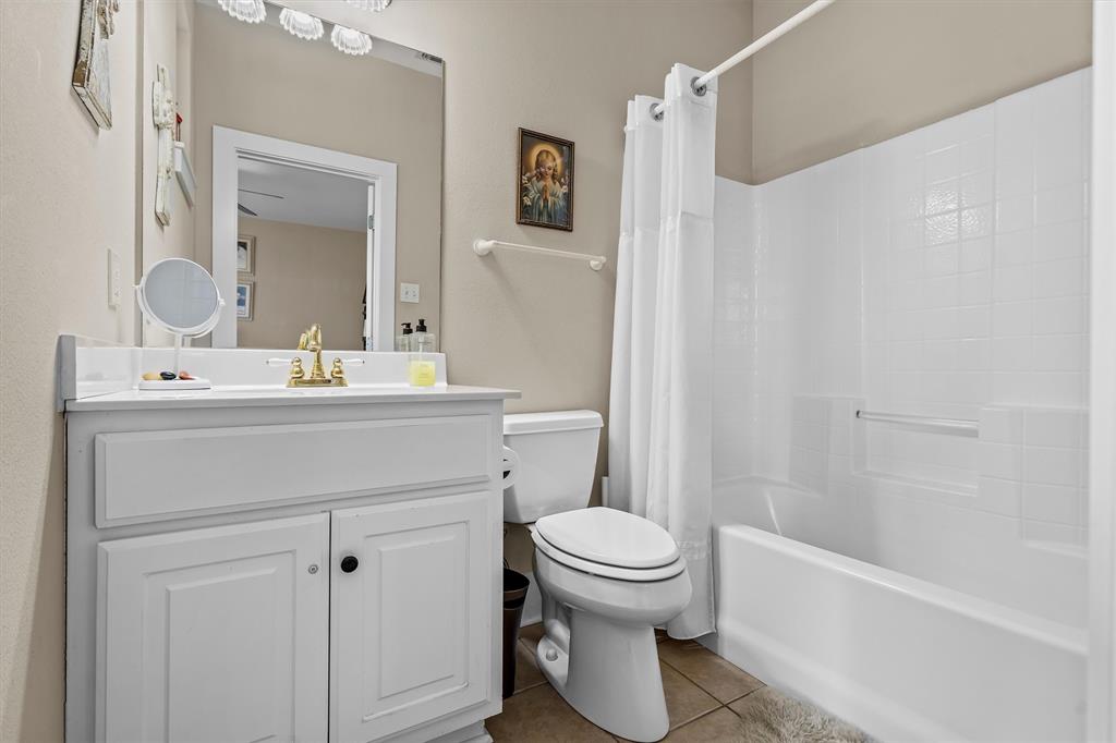 810 East Fm 321 Palestine, TX 75803 - Photo 23 of 40 a bathroom with a sink toilet and shower