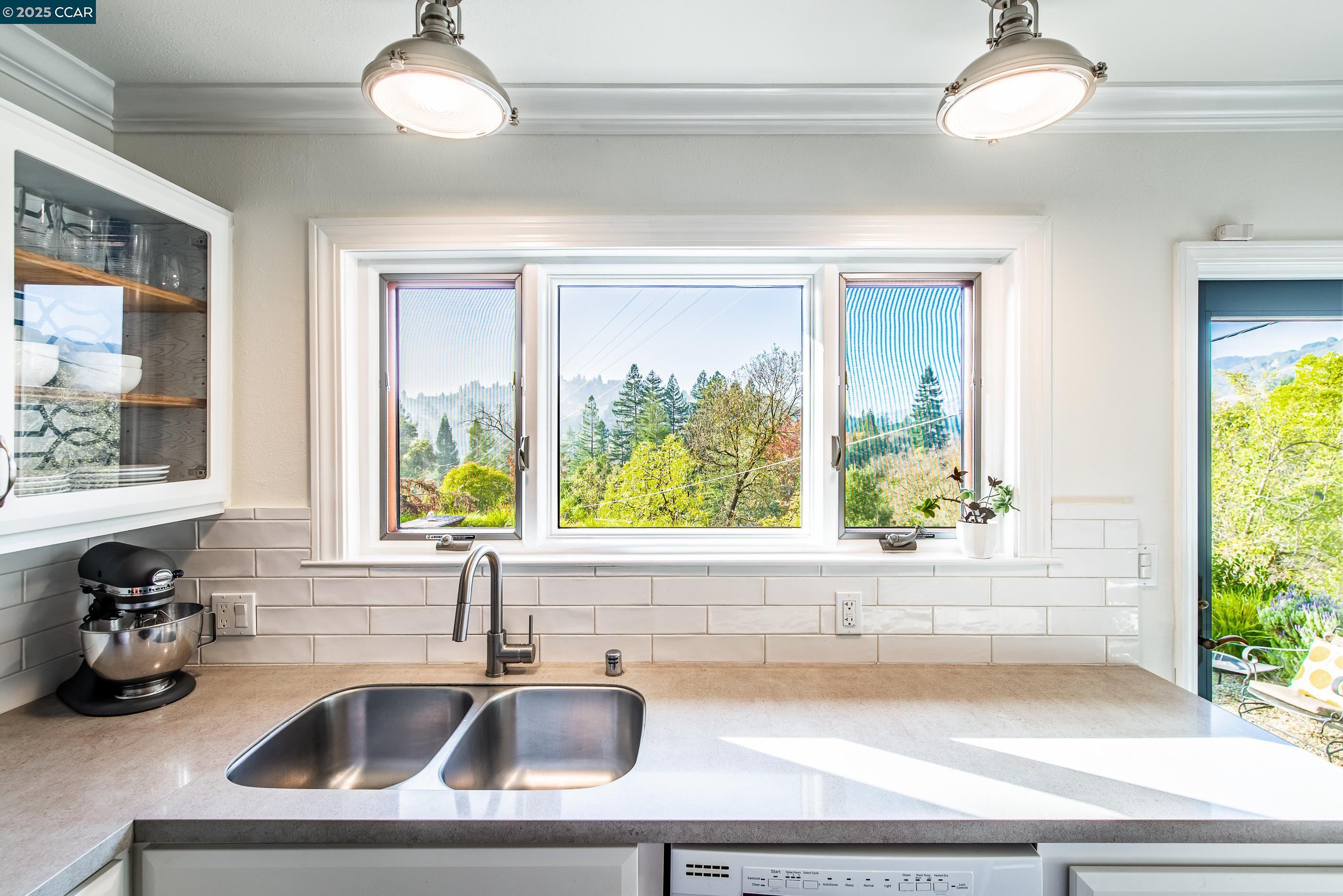 1085 Oak Hill Road, Unit D Lafayette, CA 94549 - Photo 14 of 35 a kitchen with a sink and a window