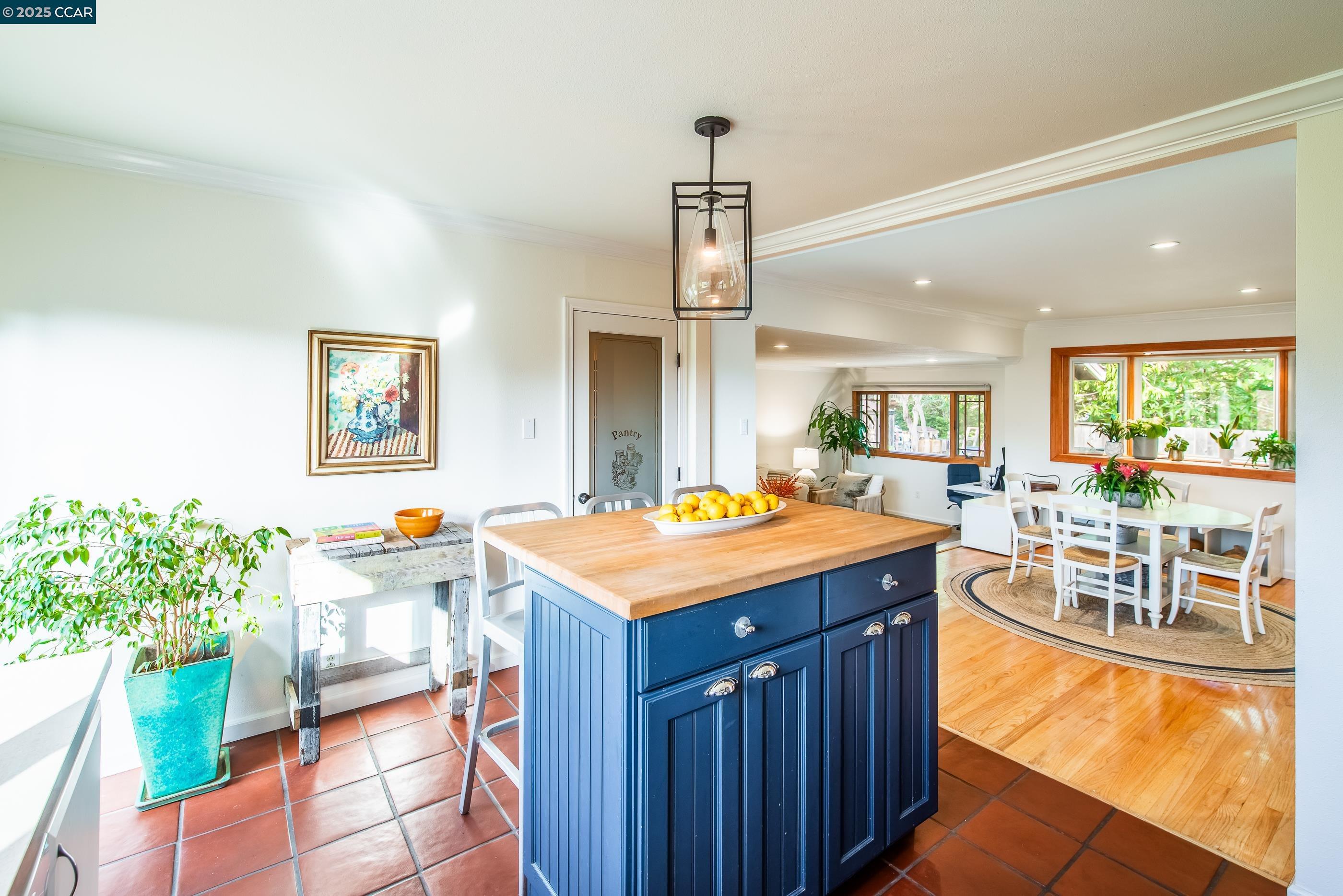 1085 Oak Hill Road, Unit D Lafayette, CA 94549 - Photo 16 of 35 wooden kitchen with stainless steel appliances granite countertop a stove a sink dishwasher and a dining table with garden view