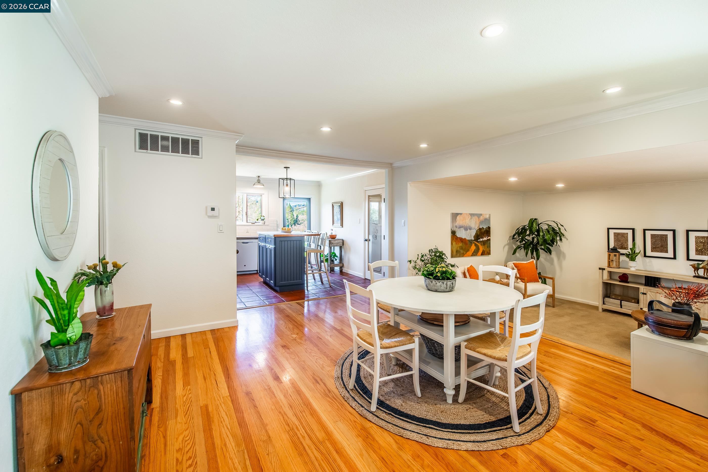 1085 Oak Hill Road, Unit D Lafayette, CA 94549 - Photo 4 of 35 a view of a dining room with furniture and wooden floor