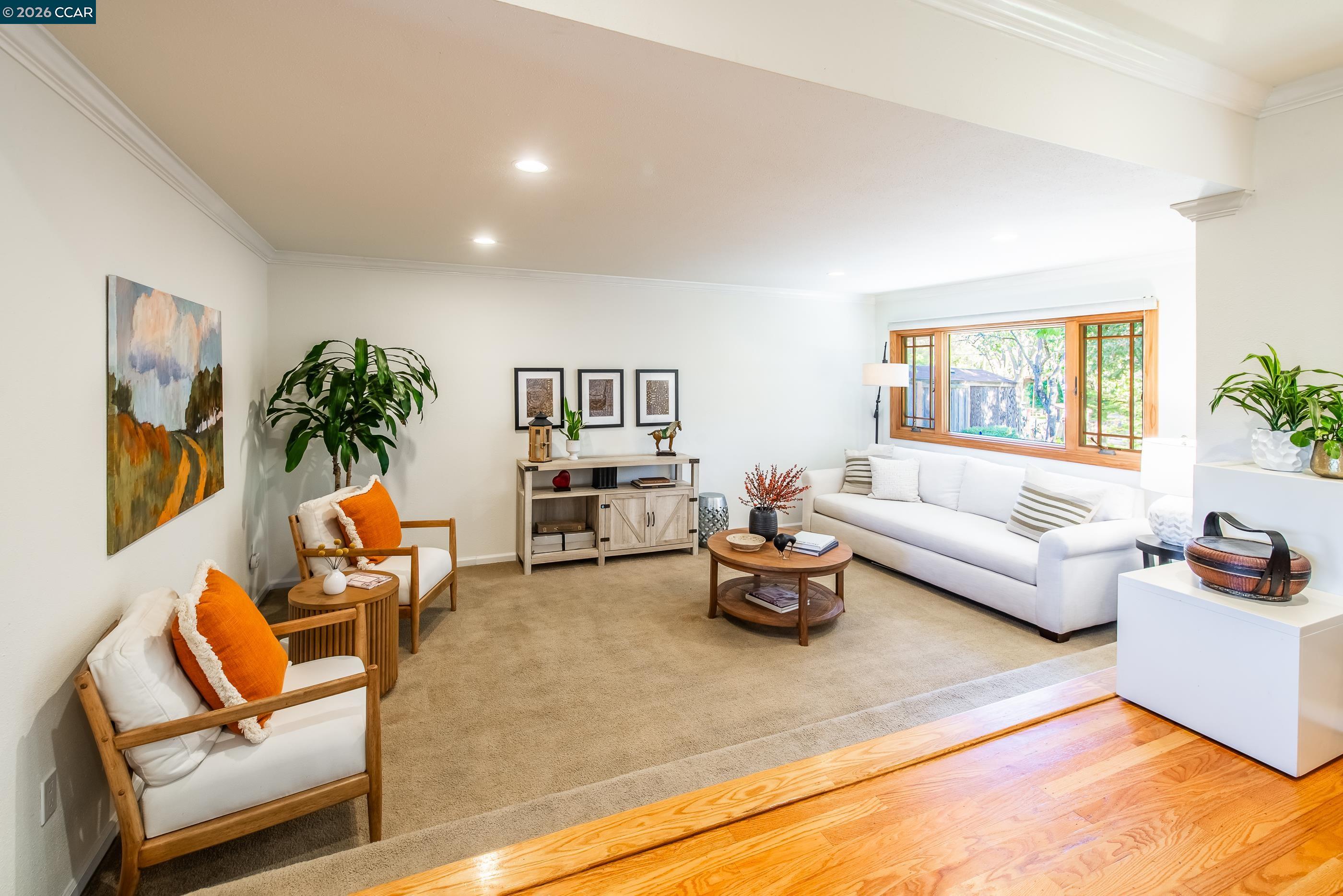 1085 Oak Hill Road, Unit D Lafayette, CA 94549 - Photo 6 of 35 a living room with furniture and a large window