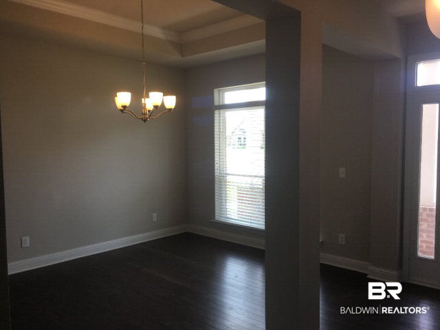 23888 Doireann Street Daphne, AL 36526 - Photo 4 of 26 The dining room and foyer have hardwood floors! This is our last brand new with this feature.