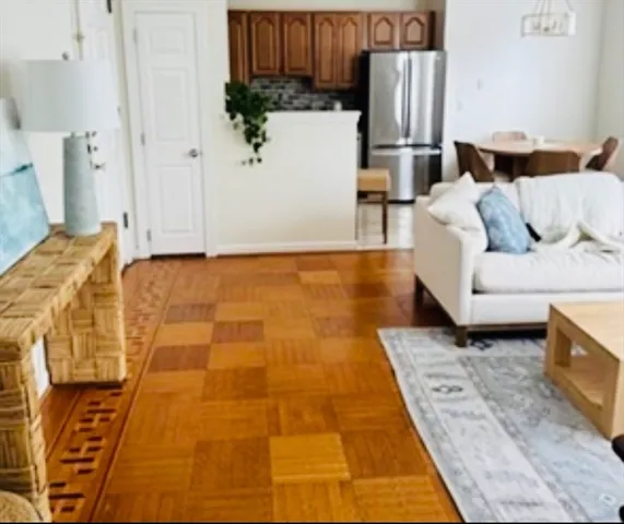 a living room with a rug