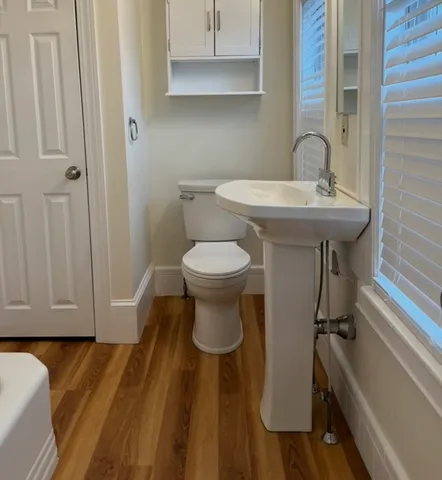 a bathroom with a sink toilet and vanity
