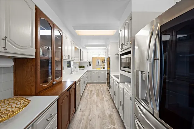 a view of a kitchen from the hallway