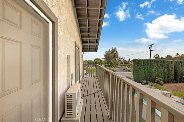 a balcony view with a garden