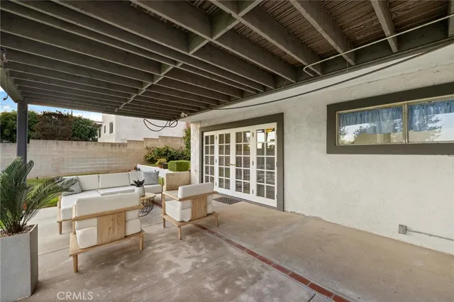 a outdoor space with patio lots of furniture