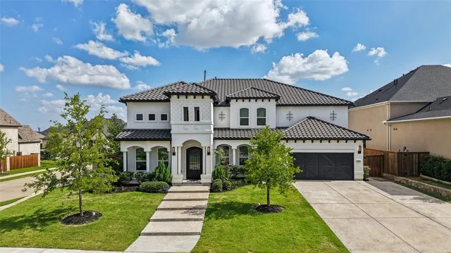 a front view of a house with a yard and a fireplace
