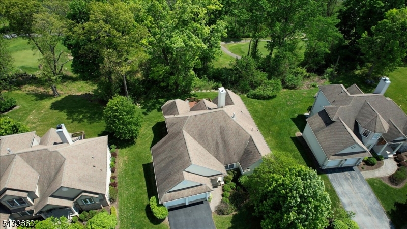 15 Bracken Hill Road Hamburg, NJ 07419 - Photo 39 of 44 an aerial view of a house with outdoor space and trees all around