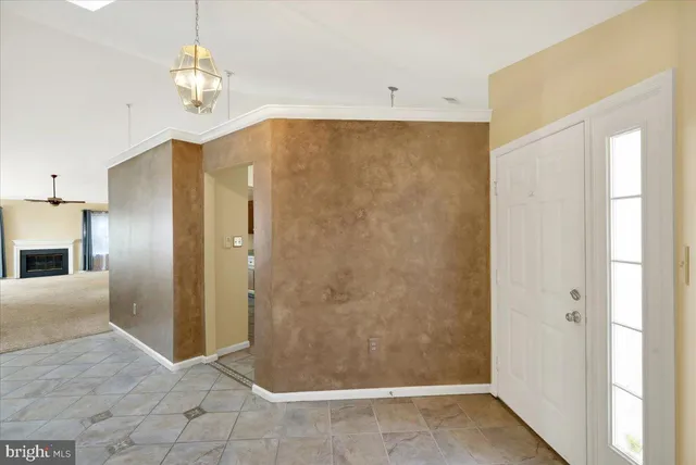 a view of a bathroom with a shower and a sink