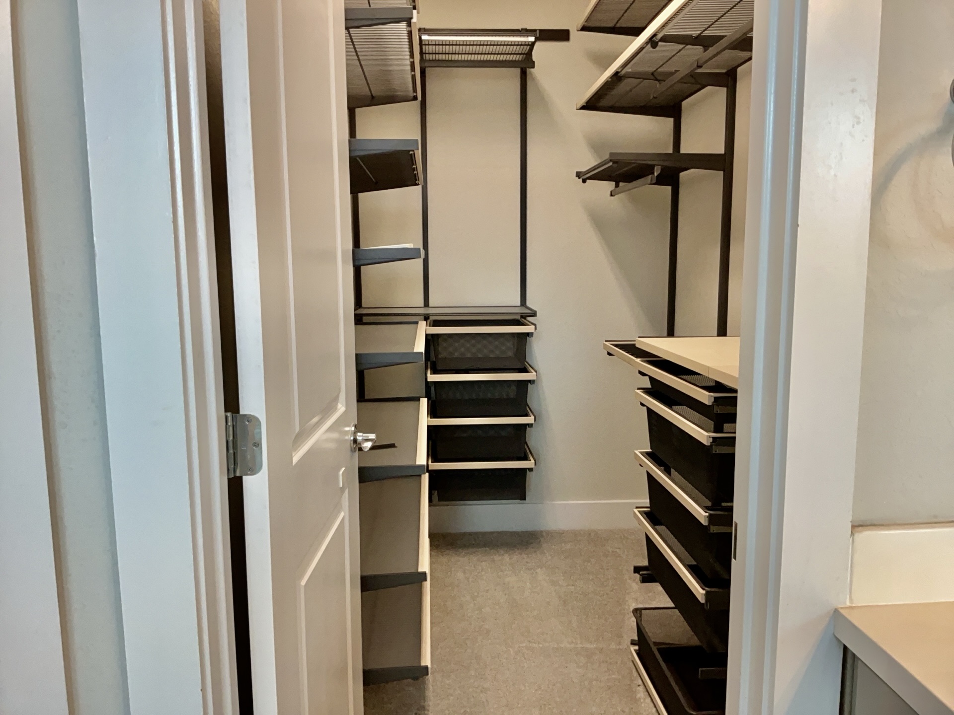 8315 Laughlin Lane Austin, TX 78744 - Photo 13 of 23 a view of walk in closet with empty racks
