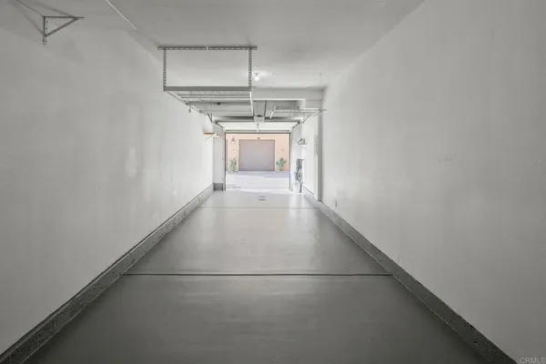 a view of a kitchen with a sink and dishwasher