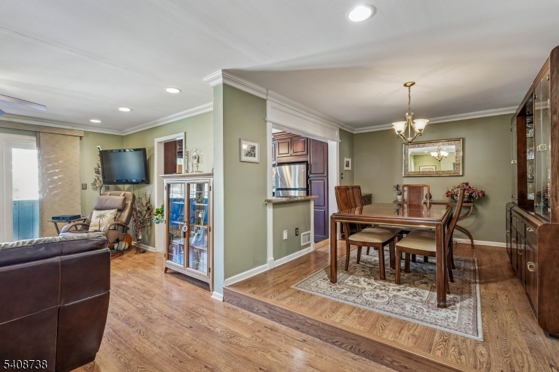 27 Espy Road, Unit A7 Caldwell, NJ 07006 - Photo 5 of 29 a view of a dining room with furniture