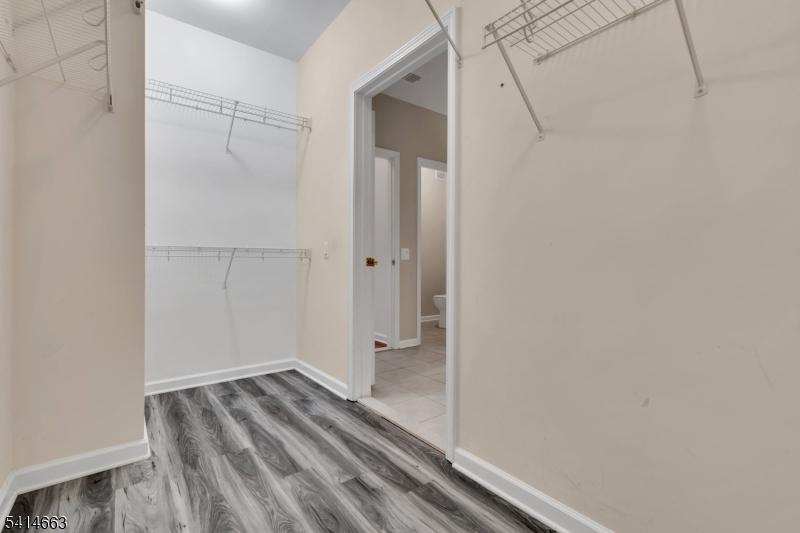 7204 Westover Way, Unit 7204 Somerset, NJ 08873 - Photo 36 of 43 a view of a room with wooden floor