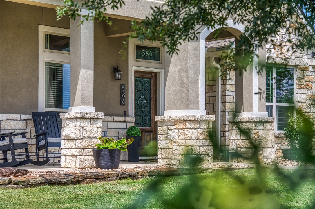 586 Ruby Drive Bellville, TX 77418 - Photo 5 of 50 a front view of a house with garden